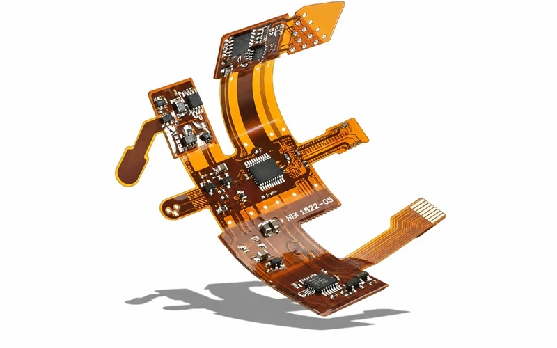 Flexible printed circuit board with SMT components