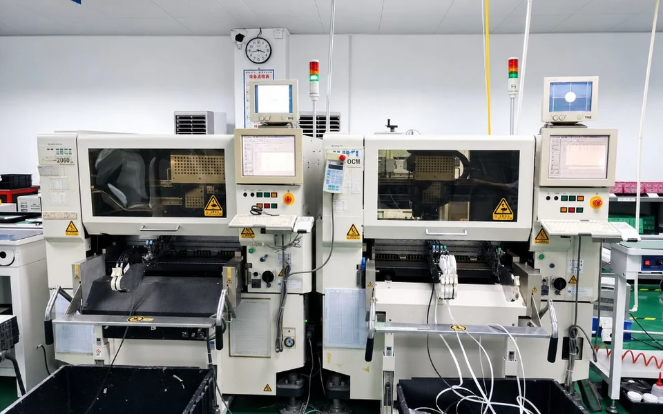 Automated SMT placement equipment in a controlled PCBA production area