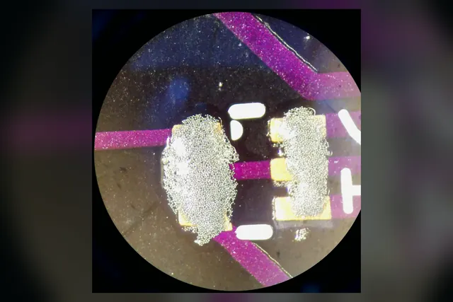 Magnified solder paste deposits on PCB pads