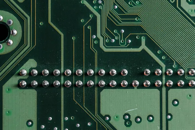 Solder-side PCB showing through-hole solder joint results