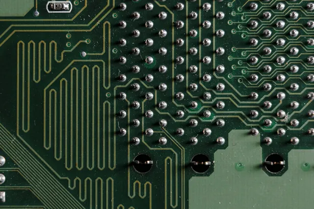 Populated PCB solder side with multiple through-hole joints