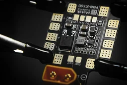 Electronic circuit board held in a test fixture for quality validation